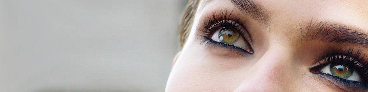 Eye Makeup Tutorials illustrative banner image - close up on woman's Eyes with mascara