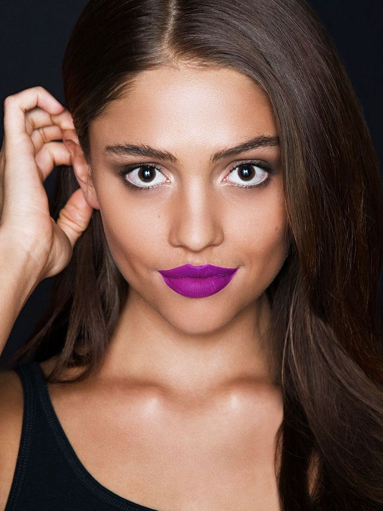 Model wearing purple Super Stay matte lipstick
